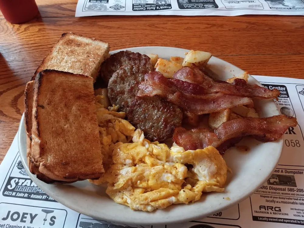 Two Eggs Any Style with Toast Home Fries or Hash Browns